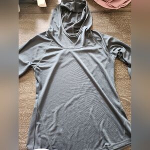 Dark green pullover. Size medium